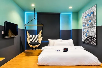 COZY DOUBLE NEST - NO WINDOW — The Hammock Hotel Fine Arts Museum